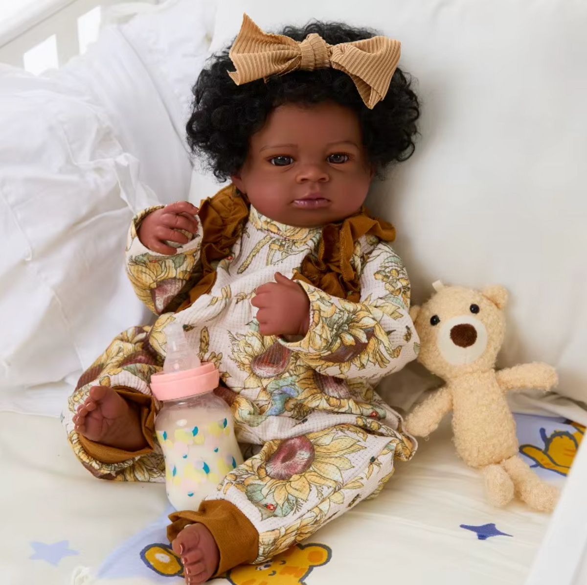 „Lanny" – 50 cm Afro-Amerikaanse Reborn babypop met donkere huid & handgeworteld haar