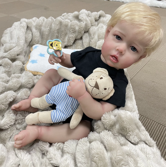 Rowan – 55 cm realistische Reborn babypop met 3D-huid en handgeworteld haar